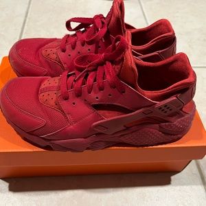 All red Nike Hurache shoe